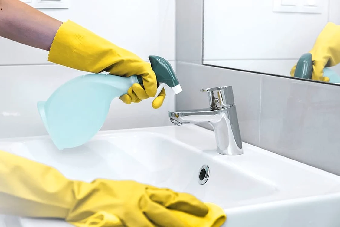 1 woman chores bathroom home cleaning sink jpg jpeg