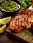 Cotlet de vitel cu sos verde  Sursa foto shutterstock 671734936 jpg