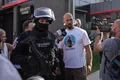 Fratii Tate sunt escortati de jandarmi la iesirea din casa in care au avut loc perchezitii urmand sa fie dusi la sediul DIICOT, in Pipera, 21 august 2024   Foto Inquam Photos  Octav Ganea(6) jpg