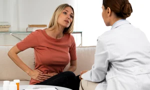 side view doctor talking woman jpg