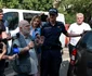Alfred Bulai este escortat de polițiști în timpul unei percheziții, în București. FOTO Inquam Photos / Cosmin Enache