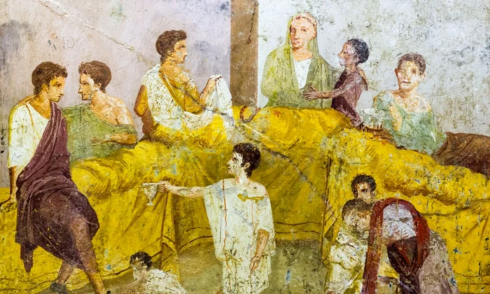 Un banchet roman. Frescă din Pompeii