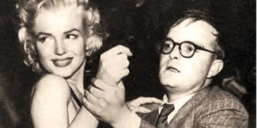 Truman Capote, dansând  cu Marilyn Monroe 