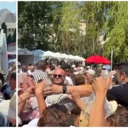 Mii de oameni s-au călcat în picioare pentru porții de mâncare gratis, la Suceava. Ambulanțele, blocate de mulțime FOTO captura vid Antena 3 CNN