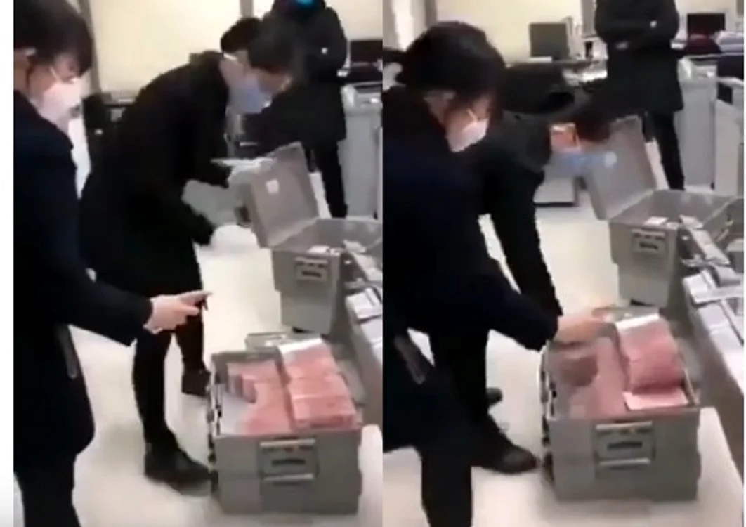 
    Banii proveniţi din zonele de risc vor fi dezinfectaţi sau distruşi. Banca Populară Chineyă va emite numerar nou, necontaminatfoto: captura CNN BUSINESS  