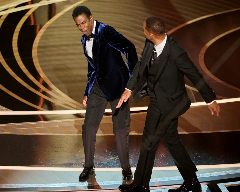 Momentul în care Will Smith îl pocnește pe Chris Rock. Foto: Profimedia