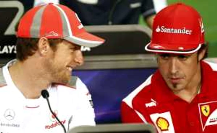 Jenson Button şi Fernando Alonso * Foto: Reuters