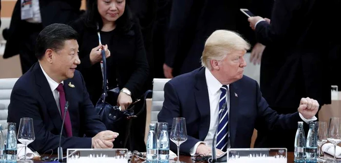 Xi Jinping (stânga) şi Donald Trump, la summitul G20 care a avut loc în iulie la Hamburg Foto: EPA
