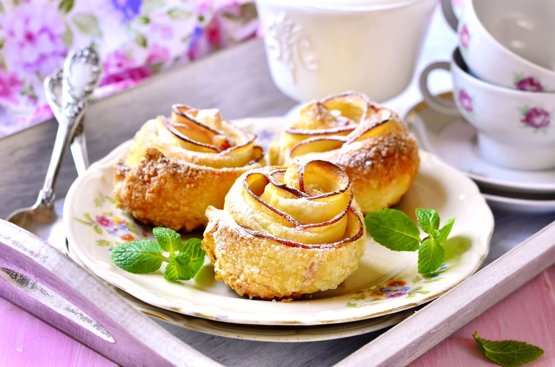 48669479   cake ''apple roses" on a vintage plate for a breakfast  jpeg