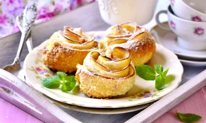 48669479   cake ''apple roses" on a vintage plate for a breakfast  jpeg