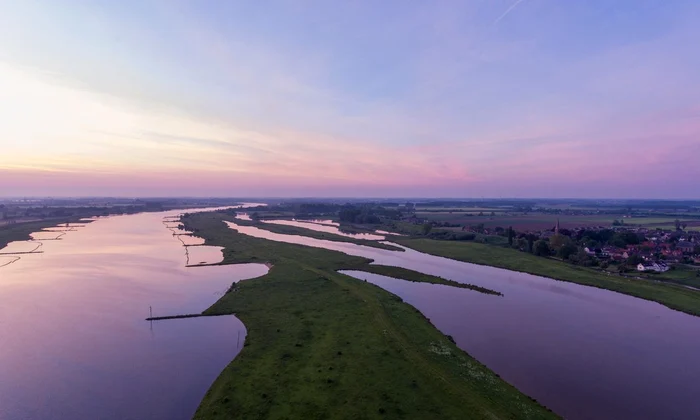lek river surrounded by everdingen village beautiful sunset netherlands jpg