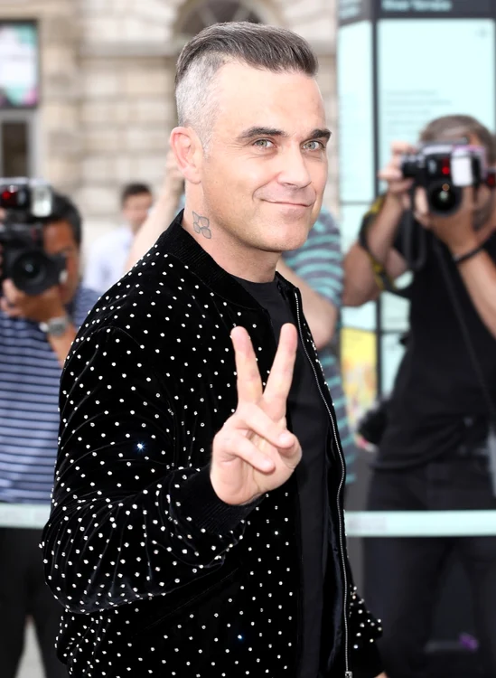 Robbie Williams s-a reîntâlnit cu copiii după ce a stat în carantină trei săptămâni FOTO Guliver/Getty Images