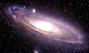 O nouă galaxie, identificată la o distanţă record faţă de Terra jpeg