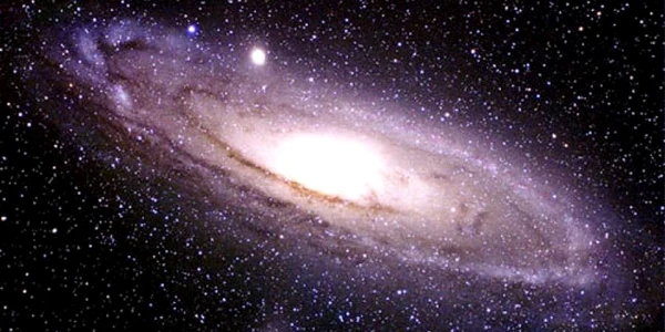 O nouă galaxie, identificată la o distanţă record faţă de Terra jpeg