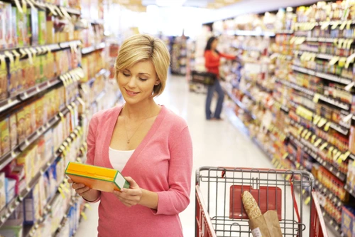 33603997 woman shopping in supermarket jpeg