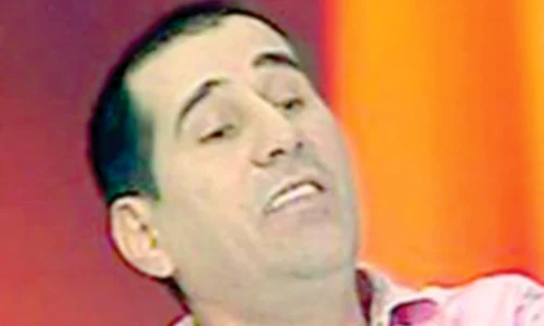 Mihai i a dat  papucii prin SMS (Foto: Arhivă personală) jpeg