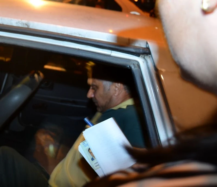 Kanan Ali privea în gol când a fost luat de poliţişti
