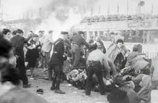 1955 Le Mans disaster Policemen Looking for Survivors UPI jpg