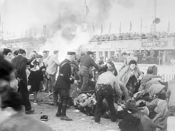 1955 Le Mans disaster Policemen Looking for Survivors UPI jpg