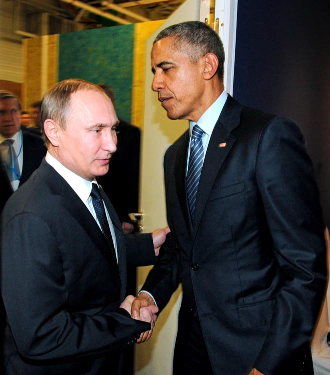 Vladimir Putin și Barack Obama își strâng mâinile la Conferința Organizației Națiunilor Unite privind Schimbările Climatice