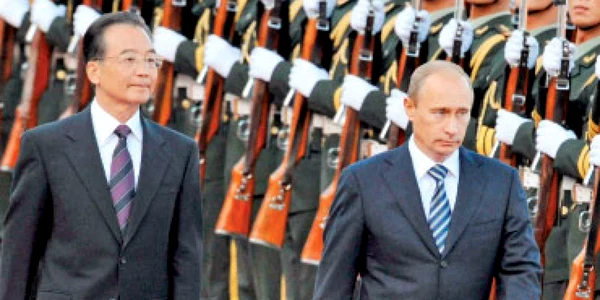 Putin se întoarce cu tolba plină din China