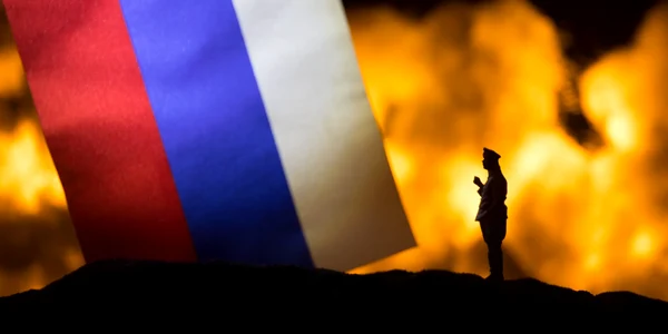 drapel rusia fundal flacari razboi explopzie shutterstock jpg