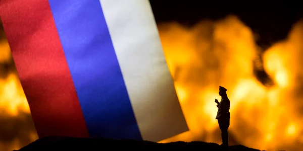drapel rusia fundal flacari razboi explopzie shutterstock jpg