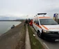 O maşină a căzut într-un lac de acumulare de pe râul Olt în Vâlcea - şoferiţa a murit iar pasagerul s-a salvat Foto ISU Vâlcea