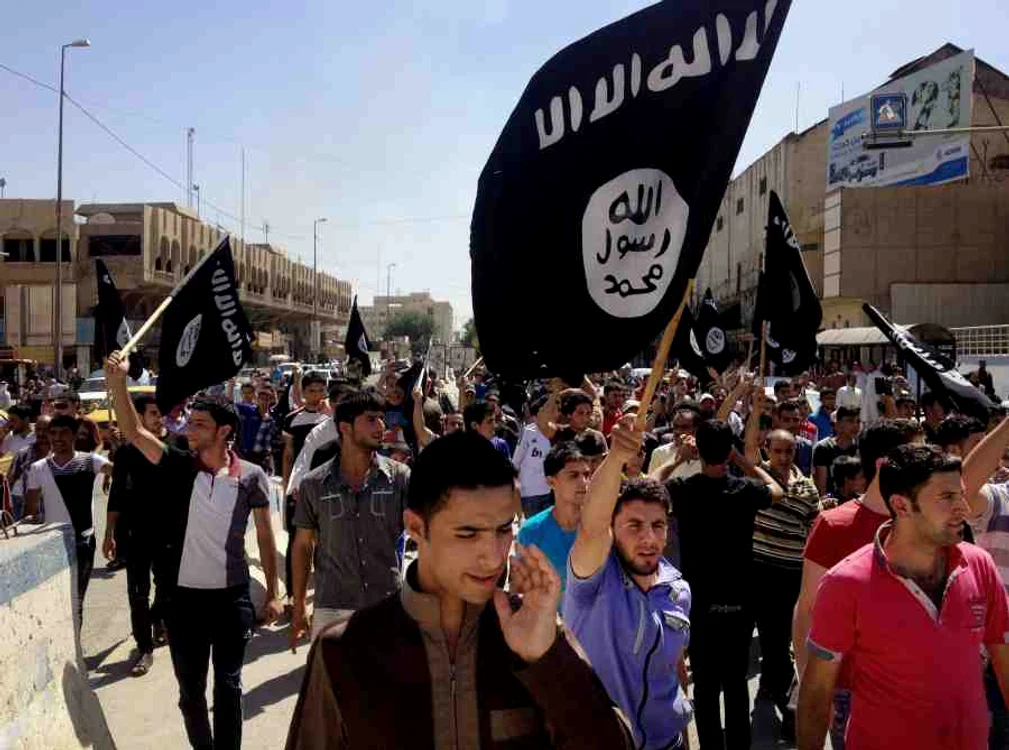 Protest în favoarea Statului Islamic, în oraşul Mosul din Irak (16 iunie 2014)