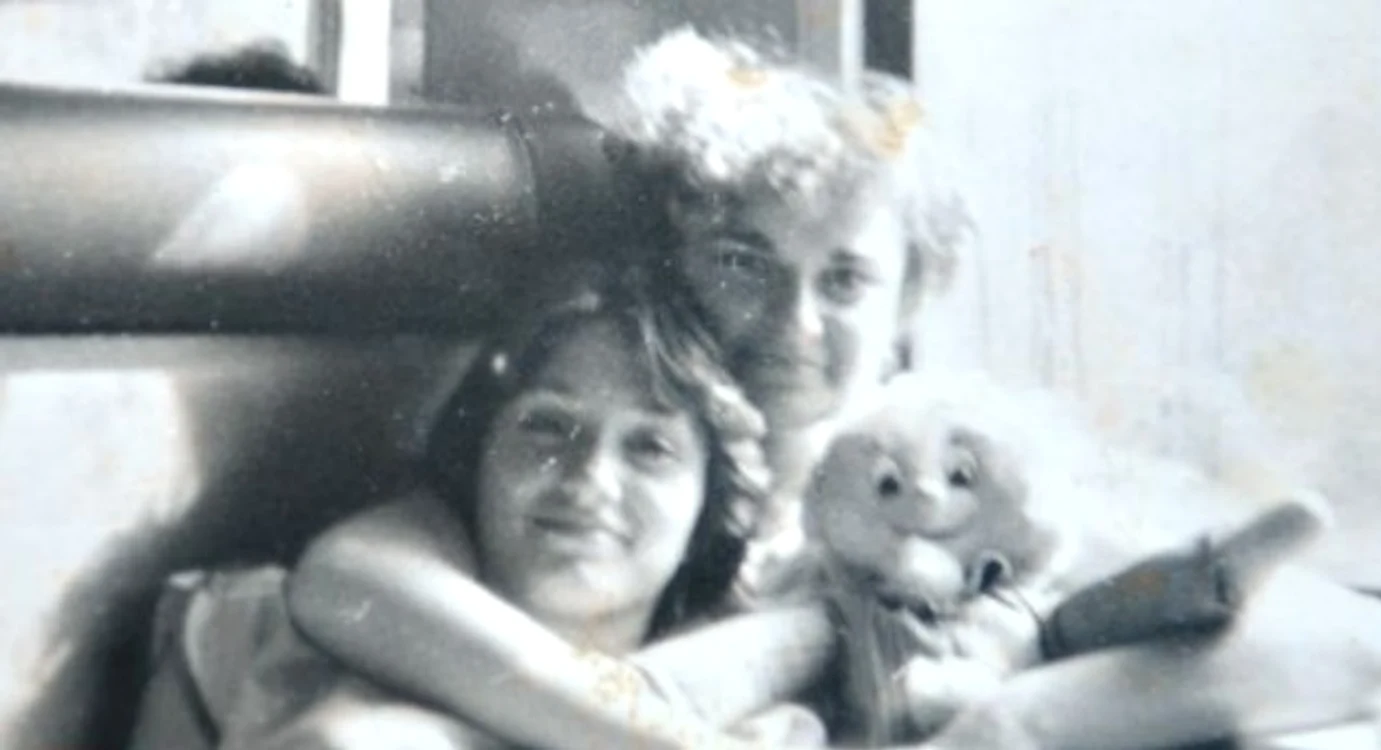 Georgica Miu, în brațele unei mătuși   FOTO Arhiva familiei