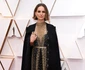 Natalie Portman a ales o ţinută statement, marca Dior, având brodate pe capă numele a opt femei regizor pe care Academia le a ignorat anul acesta jpeg