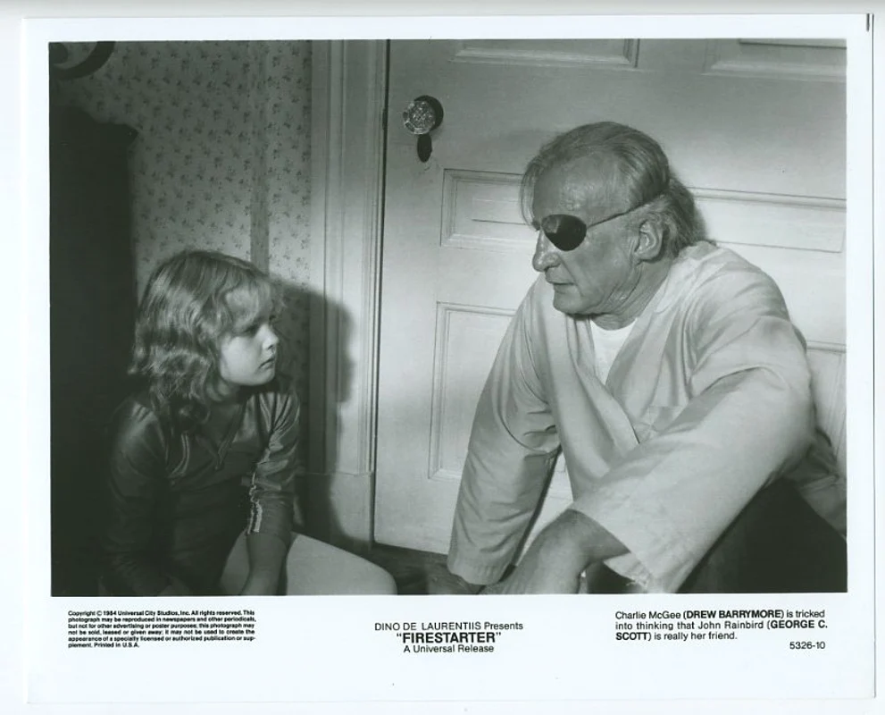 Drew Barrymore and George C  Scott in Firestarter (1984) jpeg