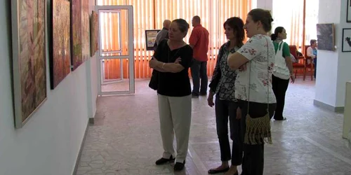 Copiii speră ca oameni mari veniţi la expoziţie să înveţe lucrui noi despre energia verde 