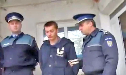 Criminalul a fost reţinut de poliţişti jpeg