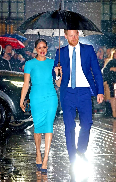 4 gettyimages 1210726181harry and meg in the rain jpg jpeg