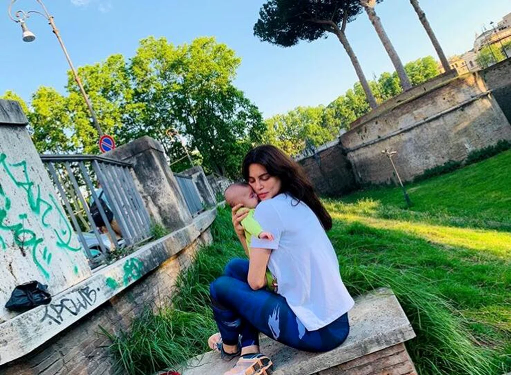 
    Albul, simbolul purității, a predominat la botezul micuței Caroline LeonFoto: arhivă personală  