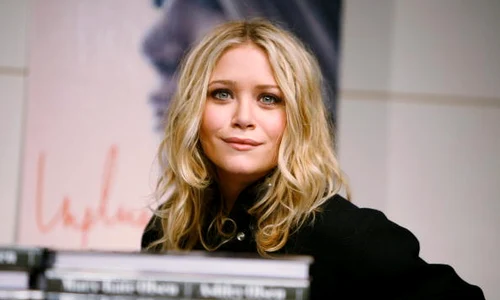 Ashley Olsen And Mary Kate Olsen Sign Copies Of "Influence" jpeg