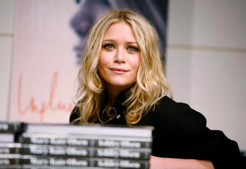 Ashley Olsen And Mary Kate Olsen Sign Copies Of "Influence" jpeg