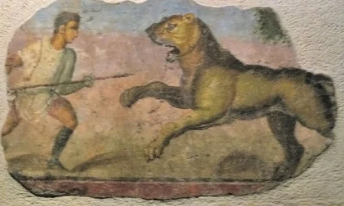 Frescă reprezentând o luptă între un gladiator și un leu (© Wikimedia Commons)