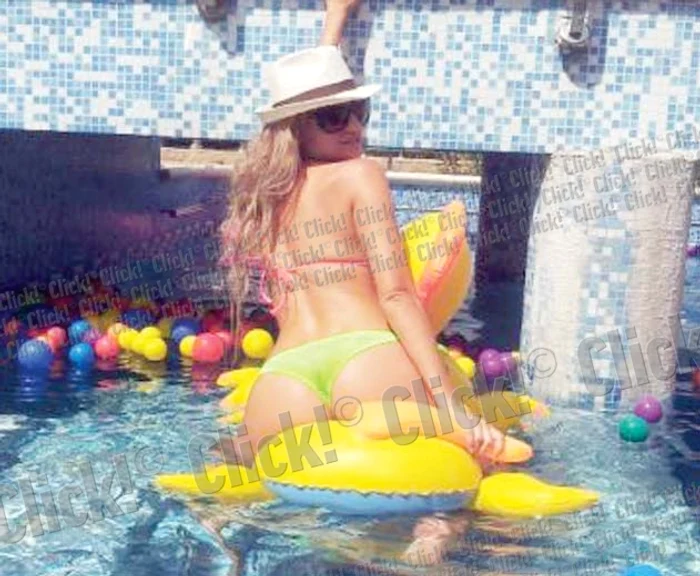 
    Sânziana Buruiană  s-a cocoţat pe un  răţoi din plastic  