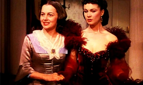 Olivia de Havilland, alături de Vivien Leigh, în filmul ”Pe aripile vântului” jpeg