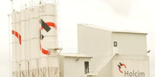 Afacerile Holcim au scăzut cu 20%