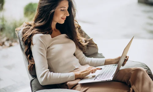 young business woman sitting cahir working computer jpg
