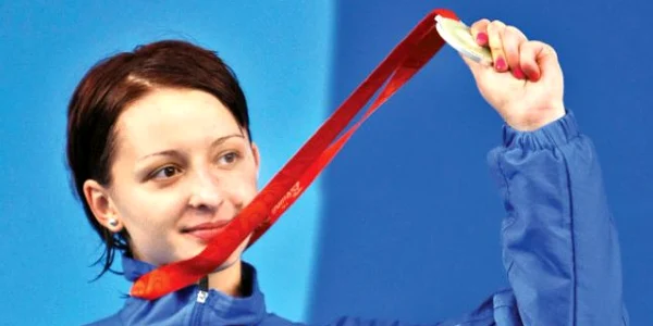 Medaliată cu argint  la Jocurile Olimpice  de la  Beijing