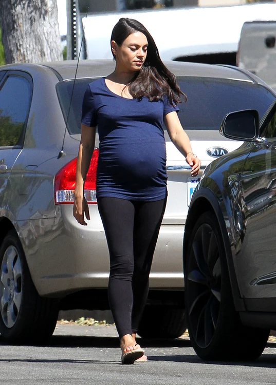 Pregnant Mila Kunis Out With Her Daughter In Los Angeles jpeg