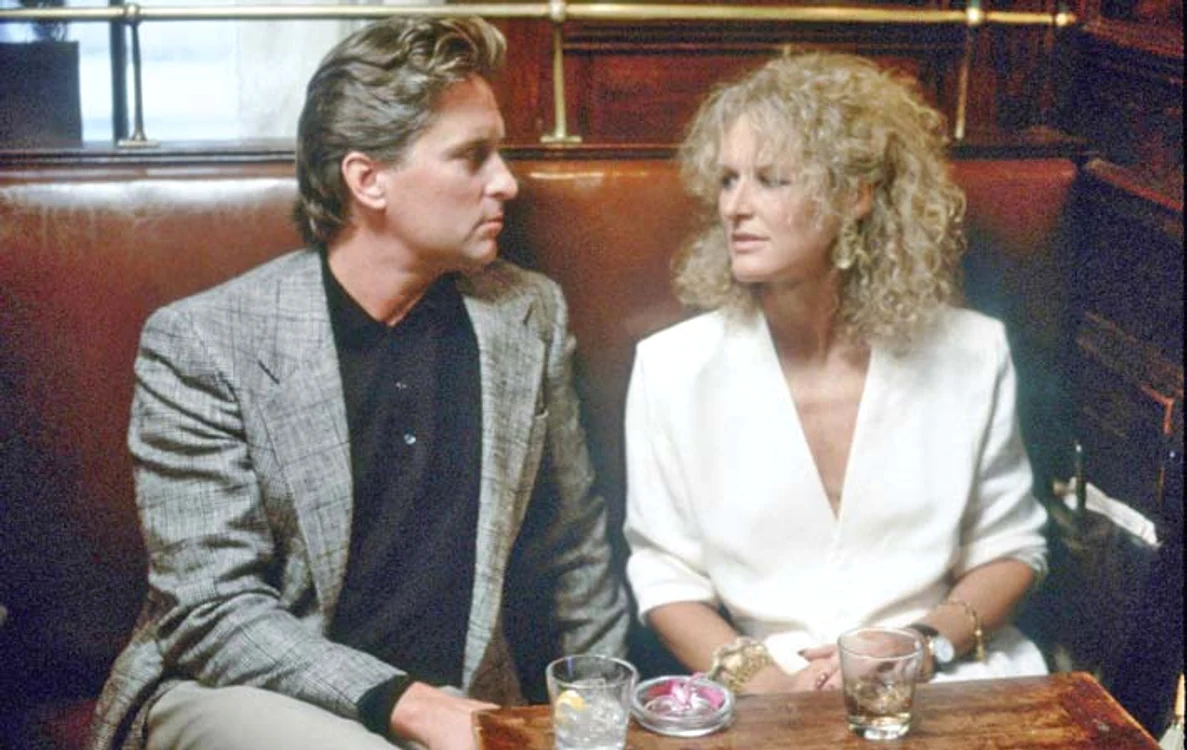 Michael şi Glenn  în filmul „Atracţie  fatală” în 1987