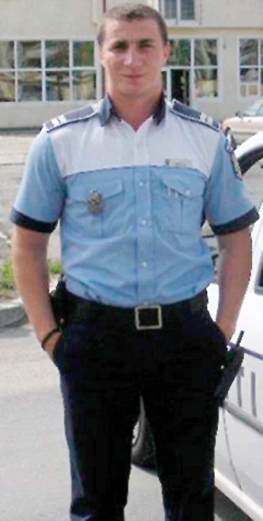 Agentul Marian Godină