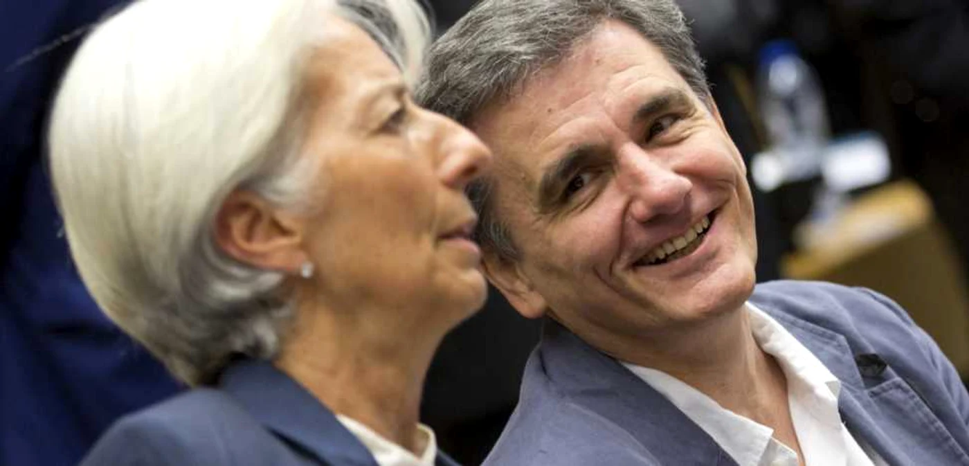 Ministrul grec de Finanţe Euclid Tsakalotos alături de directorul general al FMI, Christine Lagarde FOTO AP