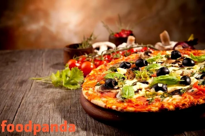 
    Pizza este cel mai comandat fel de mâncare din România, potrivit un studiu FoodpandaFoto: Foodpanda.ro  