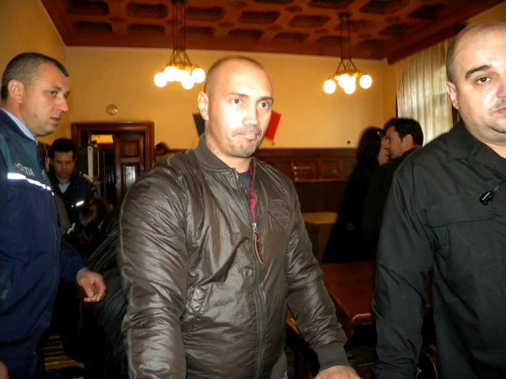 Interlopul Florin Ghinea, zis Ghenosu, a fost adus miercuri în ţară, din Marea Britanie, unde a fost reţinut din august 2018